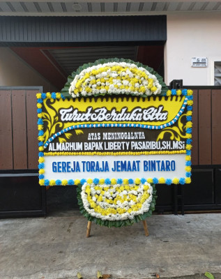 Papan Bunga Duka di Maliaro